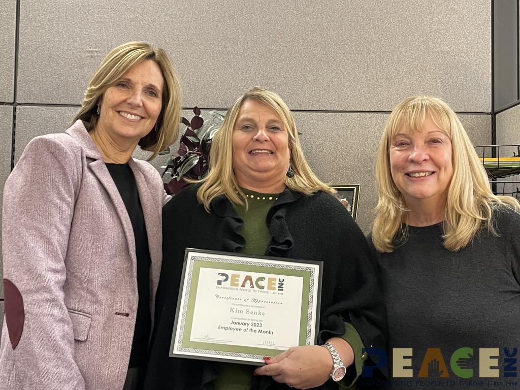 Employee of the Month Kim Senke with (L to R) Executive Director Carolyn Brown and HS/EHS Family & Community Services Manager Christine Scott.