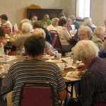 seniors eating at tables